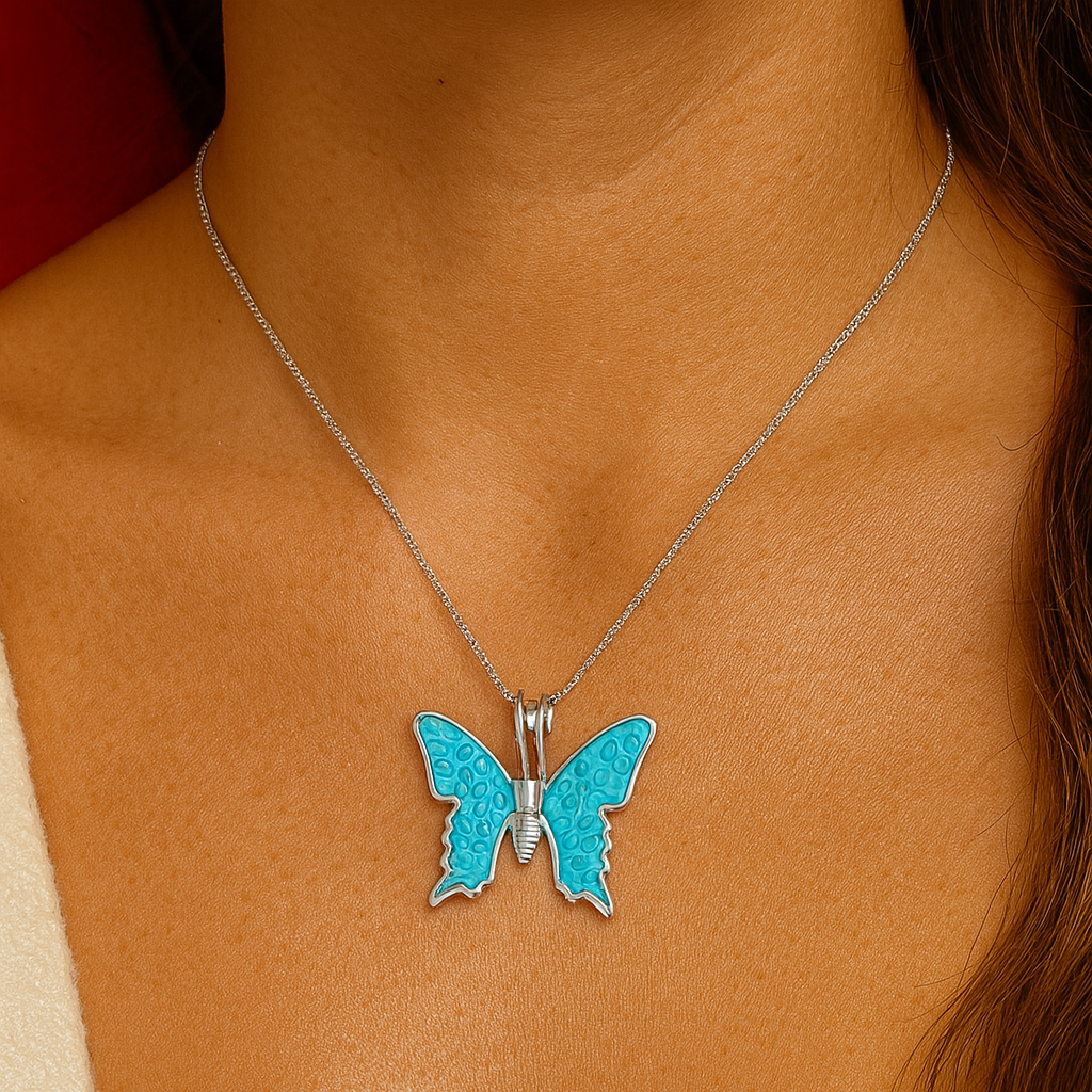 Blue butterfly pendant necklace on a person's neck